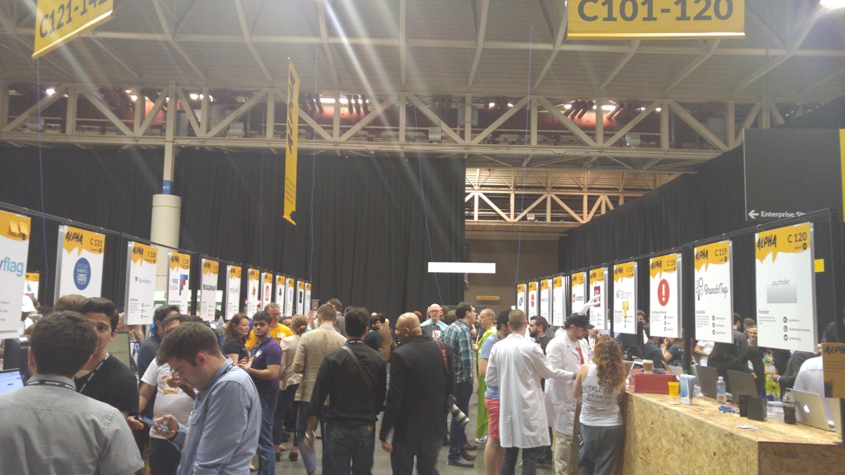 Startups fill two rows of trade show booths